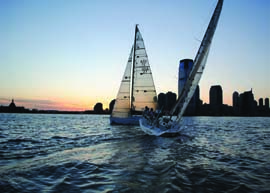 Two of Halcyon’s Farr 30s cross tacks in the shadow of the Manhattan skyline.© halcyonsailing.com halcyon_farr_30.jpg