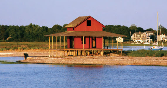 This shack, located on Grass Island where the East River meets Guilford Harbor, is perhaps the most photographed place in Guilford. Once a private residence, it is now owned by the Town of Guilford and is awaiting restoration. © Larry Kalbfeld/inaflashstudio.com This shack, located on Grass Island where the East River meets Guilford Harbor, is perhaps the most photographed place in Guilford. Once a private residence, it is now owned by the Town of Guilford and is awaiting restoration. © Larry Kalbfeld/inaflashstudio.com