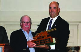 Peter Reggio (left) accepts the Harman Hawkins Award from US Sailing Race Administration Chair Hank Stuart. © US Sailing Peter Reggio (left) accepts the Harman Hawkins Award from US Sailing Race Administration Chair Hank Stuart. © US Sailing