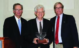 US Sailing President Thomas Hubbell (left) and Rich Jepsen, US Sailing’s Training Committee Chair (right) present the Timothea Larr Award to John Rousmaniere. © US Sailing US Sailing President Thomas Hubbell (left) and Rich Jepsen, US Sailing’s Training Committee Chair (right) present the Timothea Larr Award to John Rousmaniere. © US Sailing