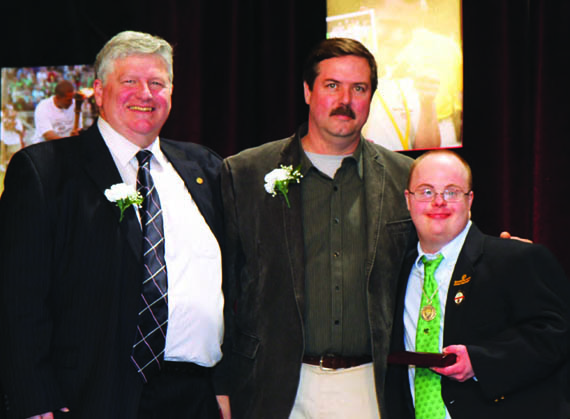 Eric Donch (center) receives an Unsung Hero Award from Beau Doherty, President of Special Olympics Connecticut (left) and Ryan Paggioli, Special Olympics Athlete at the 2013 Special Olympics Connecticut Hall of Fame Dinner. © soct.org Eric Donch (center) receives an Unsung Hero Award from Beau Doherty, President of Special Olympics Connecticut (left) and Ryan Paggioli, Special Olympics Athlete at the 2013 Special Olympics Connecticut Hall of Fame Dinner. © soct.org