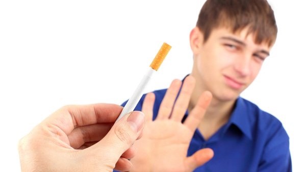 Picture of boy saying no to cigarettes