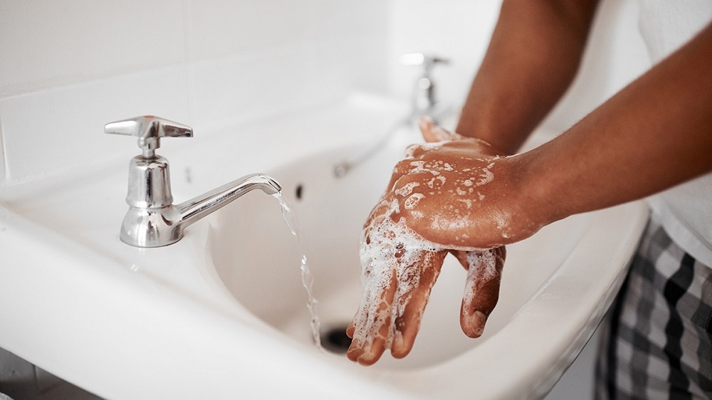 Woman washing hands