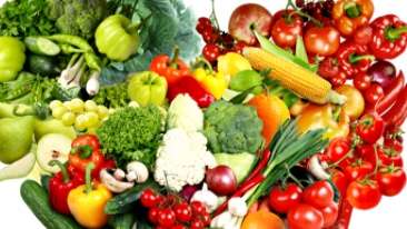 A grouping of fruit and vegetables on a table