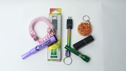 A picture of 5 different vape devices, some of which look a lot like common office supplies